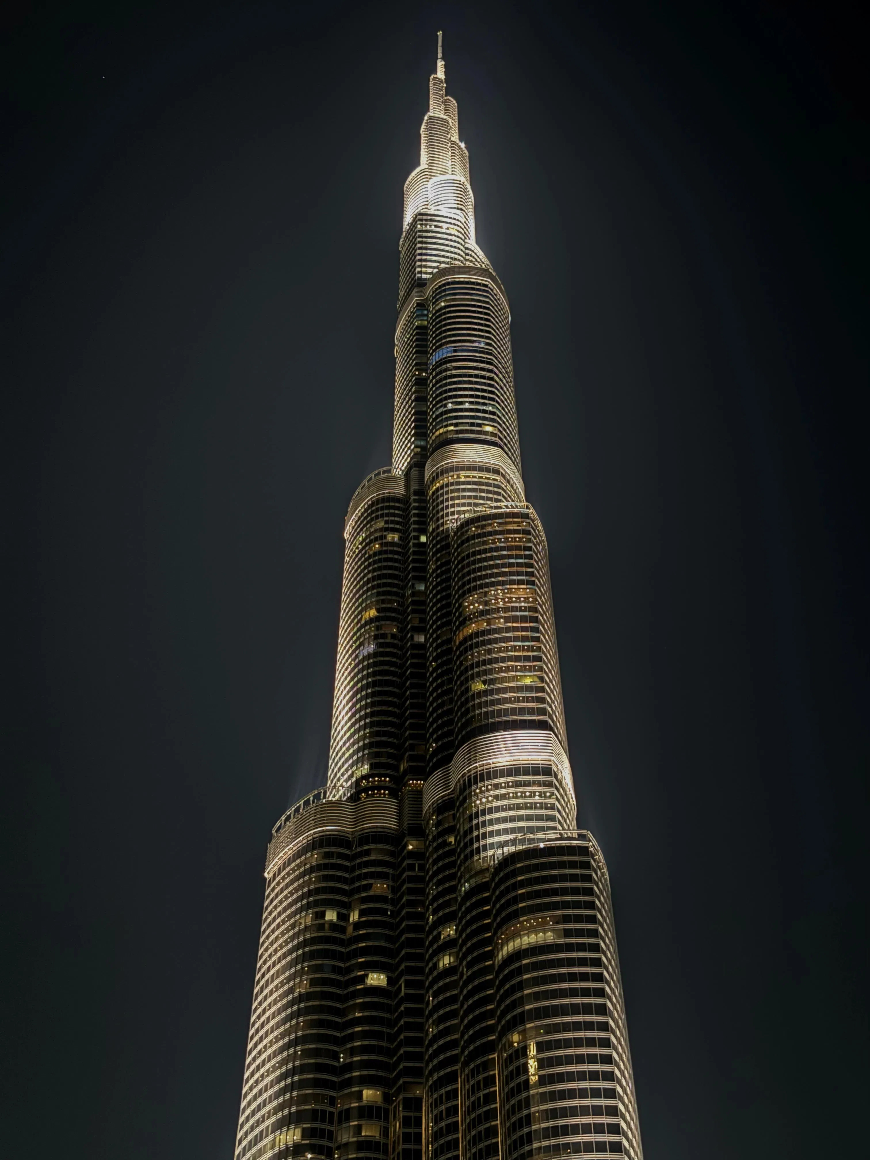 The Burj Khalifa illuminated at night on Akhil’s first international trip